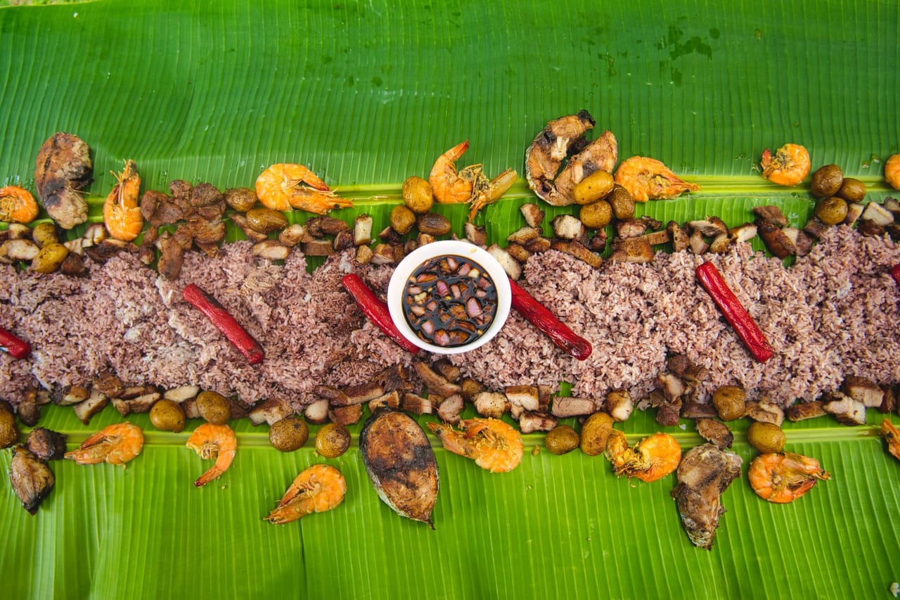 Kamayan-style beach feast, island-hopping day